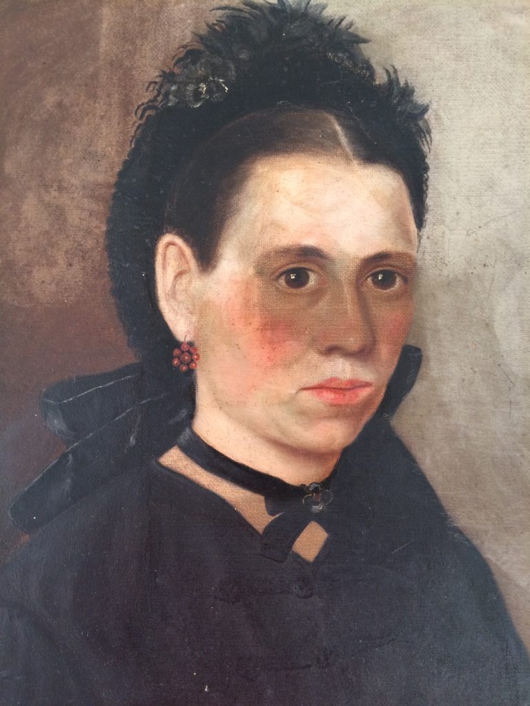 Decades of nicotine contamination had adhered to the finely worked female portrait.
